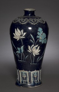Prunus Vase (Meiping) with Blossoming Lotus: Fahua Ware, late 15th Century. Creator: Unknown.