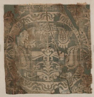 Roundel with angular palmette tree, from a tunic, 650-850. Creator: Unknown.