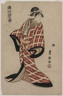 Segawa Michinosuke Wearing a Padded Plaid Robe, c. 1805. Creator: Utagawa Toyokuni (Japanese, 1769-1825).