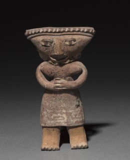 Standing figurine holding an animal (dog?), 300 B.C. to A.D. 300. Creator: Unknown.