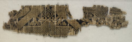 Textile Fragment with Portions of Eight-Pointed Star and Birds, 11th-12th century. Creator: Unknown.