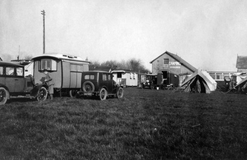 Voyageur caravan with Austin Seven on campsite  early 1930's. Creator: Unknown.