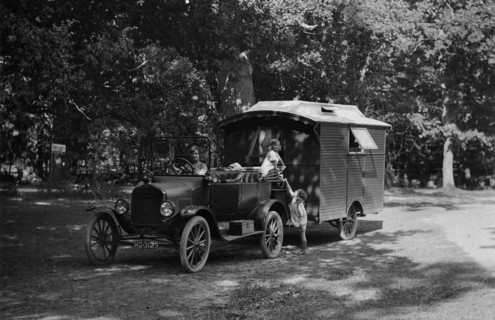 1921 Ford Model T with caravan. Creator: Unknown.