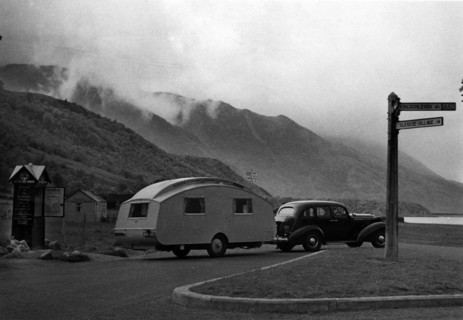 1936 Oldsmobile Eight with caravan in Scotland. Creator: Unknown.