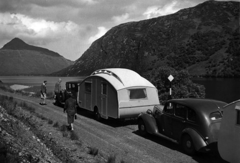 Group of cars and caravans camping in Scottish Highlands 1930's. Creator: Unknown.