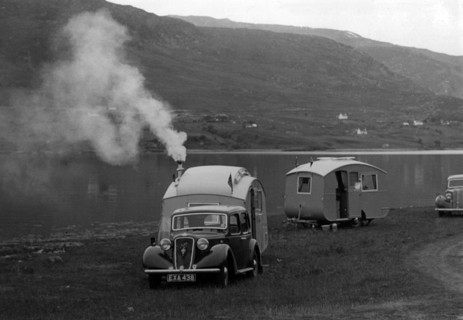 1937 Austin 12hp saloon with caravan. Creator: Unknown.