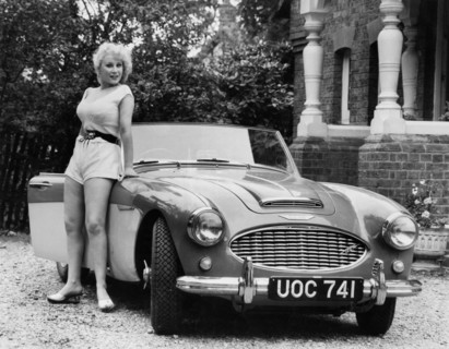 1957 Austin - Healey 100-6 with model. Creator: Unknown.