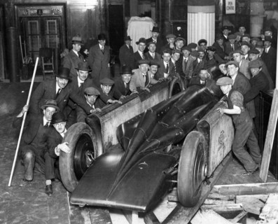 Golden Arrow with crowd of people after unpacking from crate 1929. Creator: Unknown.