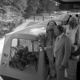 The Wombles with Lord Montagu at opening of Beaulieu Monorail 1974. Creator: Unknown.