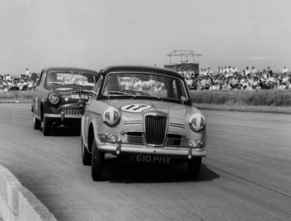 Riley 1.5, Grace leads Jack Sears in Austin Westminster at Silverstone 1958. Creator: Unknown.