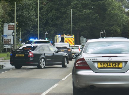 Ambulance attending road traffic accident, A35 Hampshire 2017. Creator: Unknown.