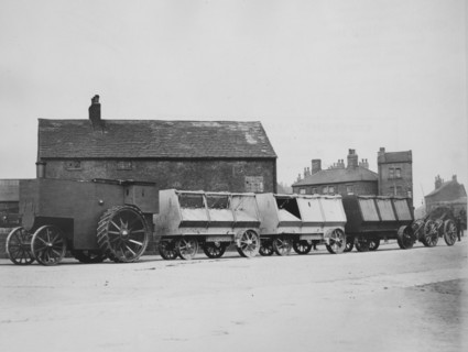 1900 Fowler armoured traction engine with munitions wagons. Creator: Unknown.