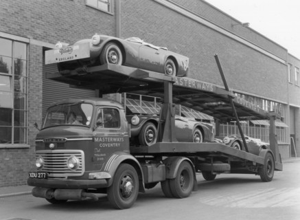 Daimler Dart SP250s on car transporter for delivery 1960. Creator: Unknown.