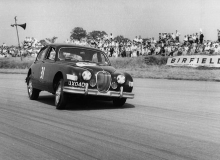 Jaguar Mk1 racing at Silverstone. Creator: Unknown.