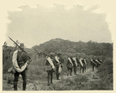 'On the Way from Battlefield of 1st and 10th to "Rough Riders" Scene of Conflict, over the Mountains Creator: Burr McIntosh.