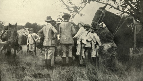 'General Lawton Learning from Cuban Officers...June 30th', Spanish-American War, 1898, (1899). Creator: Burr McIntosh.