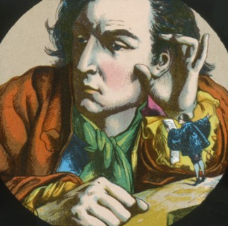 Gulliver listens to a Lilluputian reading a proclamation, lantern slide, late 19th century.  Creator: Unknown.