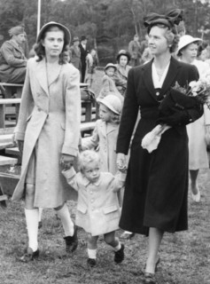 Crown Prince Carl Gustav with mother Sibylla and big sister Margaretha, Stockholm, 1947.  Creator: Unknown.