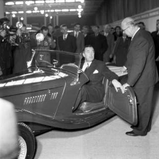 Prince Bertil tests a convertible at the car showroom in Stockholm, Sweden, 1954.  Creator: Unknown.