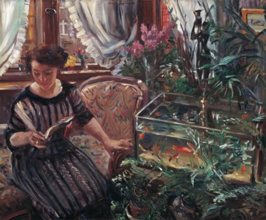 A Woman Reading near a Goldfish Tank, 1911. Creator: Corinth, Lovis
