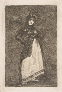 A 'Maja' standing against a dark background