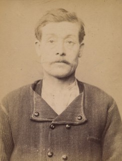Augendre. Ernest. 37 ans, né à St-Pierre le Moutier (Nièvre). Maçon. Anarchiste. 1/3/94., 1894.
