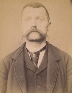 Imhof. Louis, Alfred. 37 ans, né à Mex (Suisse). Journalier. Anarchiste. 1/3/94., 1894.