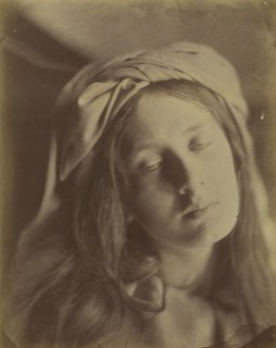 Beatrice, 1866. The model (May Prinsep) has her hair loose with a turban at the top of her head. Cameron based the model?s pose, drapery and sad expression on a painting attributed to Guido Reni that ...