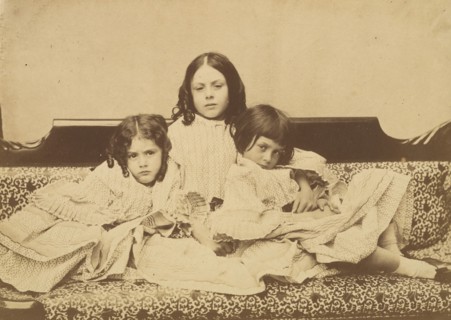 Edith, Ina and Alice Liddell on a Sofa, Summer 1858.