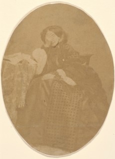 [La Comtesse at Table with Hand to Face], 1860s.