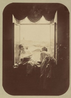 [Two Young Women at Window], ca. 1870.