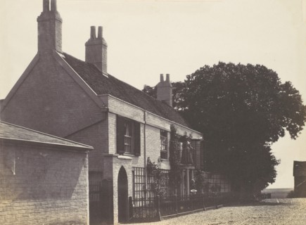 House with Woman on Balcony, Man Standing Below, ca. 1857.