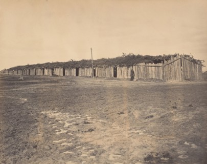 Civil War View, 1860s. (Section of log stalls [?] at City Point Virginia).