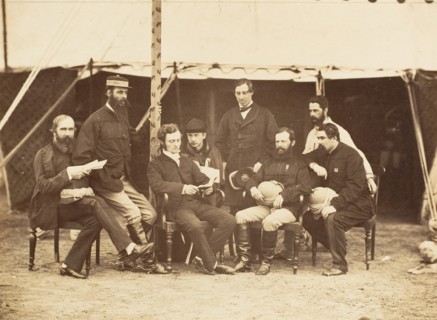 Group Portrait: (L-R) Col.Yule P.W.D., Major Jones A.D.C., Mr. Walters, Captain Stanley A.D.C., Captain Baring A.D.C., Captain Roberts V.C.D.A.Q.M.G., Captain Hills V.C. A.D.C. and Sir E. Campbell Bar...