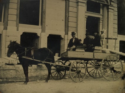Three Men Seated in a Horse-Drawn Buggy in Front of a Building Under Construction, 1850s-60s.