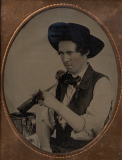 Painter Dipping Brush into Paint Jug, late 1850s-60s.
