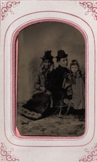Two Women and a Child, 1860s.