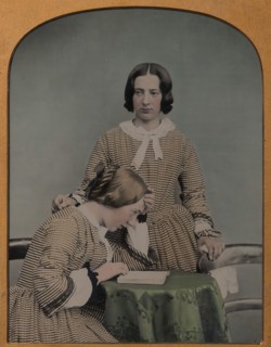 Two Women Wearing Striped Dresses, One Standing, the Other Seated, 1850s-60s.