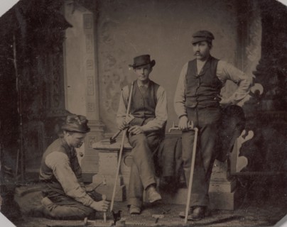 Three Plumbers with Pipes and Tools, 1870s-80s.