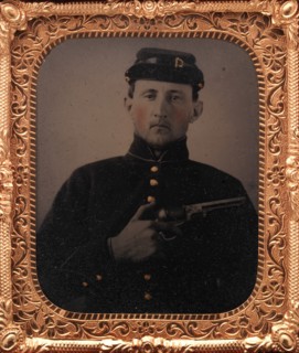 Union Soldier with Colt Revolver, in Studio, 1861-65.