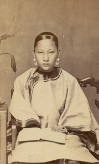 Young Woman with Earrings, 1870s.