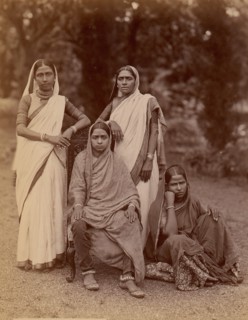Four Hindu Women, One Seated in a Chair, Outdoors, 1860s-70s.