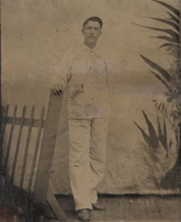 Painter Resting His Hand on Picket Fence, 1860s-80s.