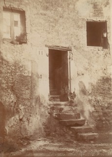 Doorway Into Crumbling Brick Building, 1850s.