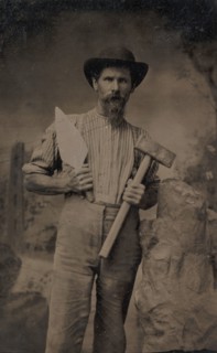 Mason (?) Holding a Trowel and Sledgehammer, 1870s-80s.