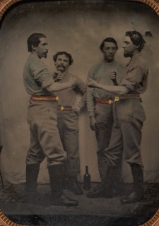 Four Pugilists with a Bottle at Their Feet, 1870-80s.