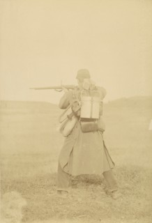 [Standing Soldier Aiming Rifle], 1880s-90s.