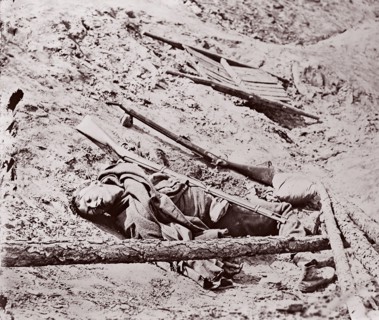 Dead Confederate Soldier at Fort Mahone, Petersburg, 1864. Formerly attributed to Mathew B. Brady.