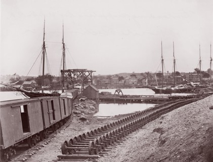 Unloading Supplies for U.S. Military Railroad opposite Richmond, Virginia, ca. 1865. Formerly attributed to Mathew B. Brady.