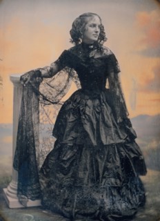 Woman in Black Taffeta Dress and Lace Shawl, ca. 1850.